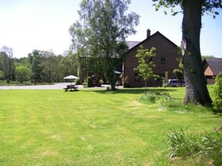 Across the garden. View from the road